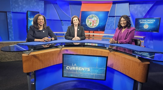 Capri maddox, Joumana Silyan-Saba, and Anchor of LA Currents Anita Bennett sitting at the anchor desk 