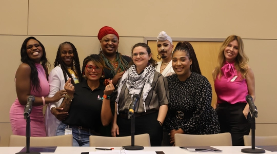 Group photo of the TGI2+ Housing and Resource Fair Panelists