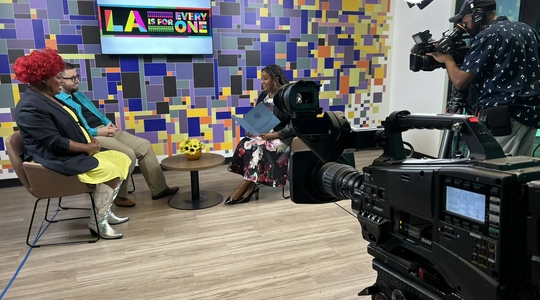 Commissioners talking on camera about Pride Month and TGi2+ Housing and Resource Fair