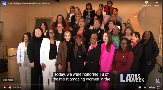 Still image of 30 women standing together with LA This Week and You Tube logos. Closed Caption reads Today we are honoring 18 of the most amazing women in the...