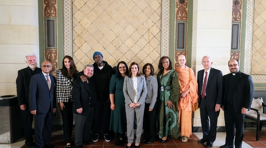 Group photo of LA Civil Rights staff with religious and spiritual leaders.