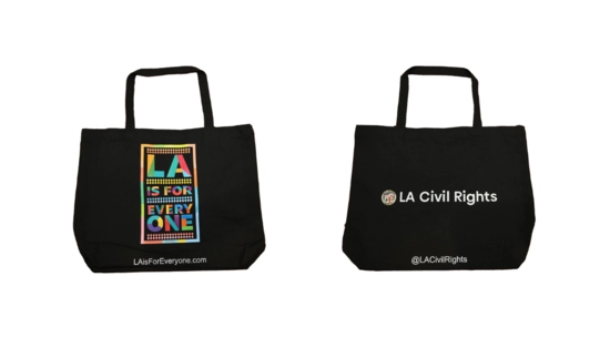 Black tote bag with LA is For Everyone logo on front and LA Civil Rights logo on the bacl