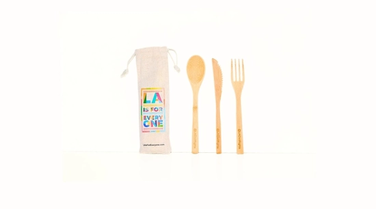 Set of bamboo cutlery with LA for All brand —on fork, knife, and spoon—packed in a convenient LA For All travel bag.