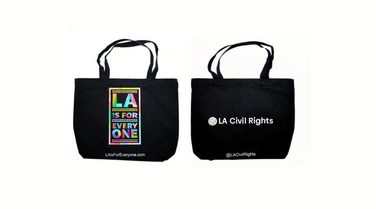 Black tote bag with LA is For Everyone logo on front and LA Civil Rights logo on the back