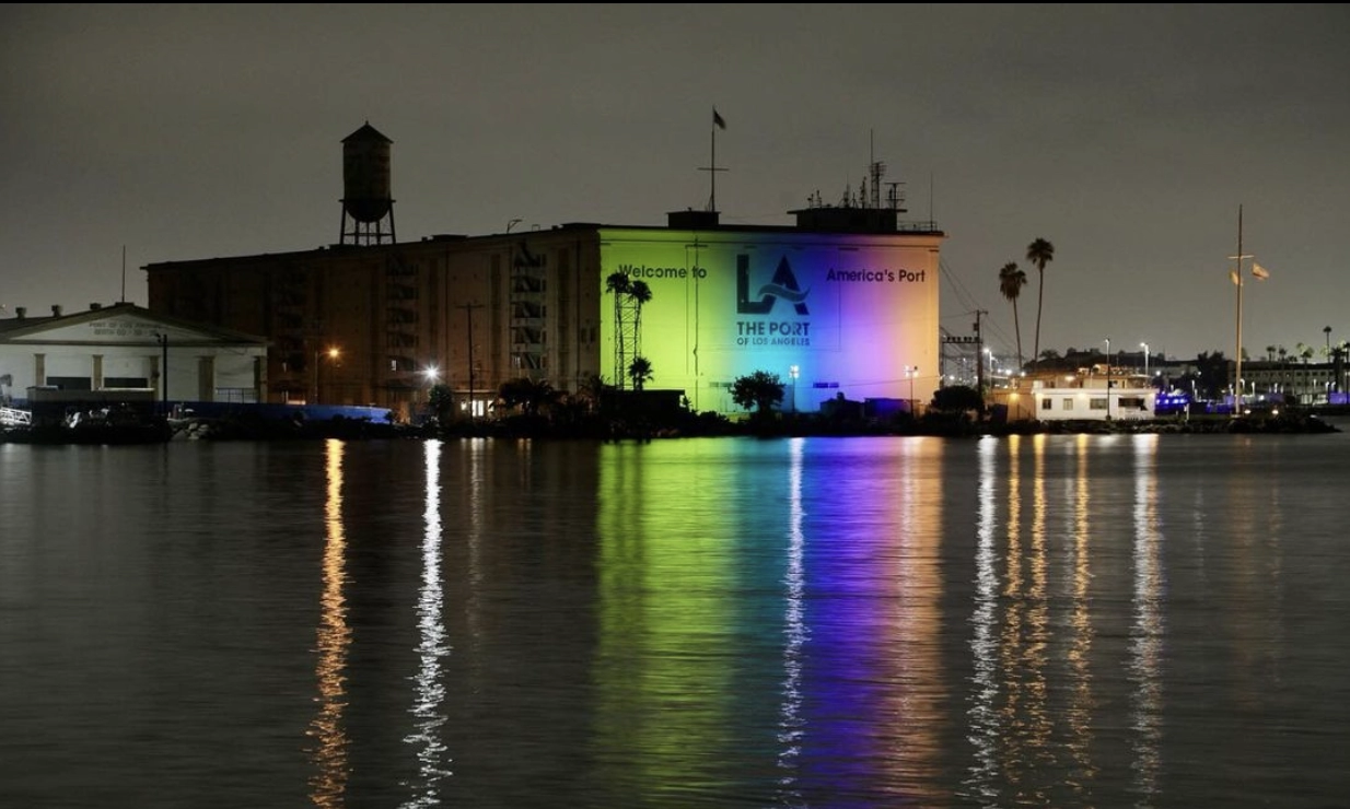Warehouse 1 at the Port of Los Angeles lit up in LA for All colors