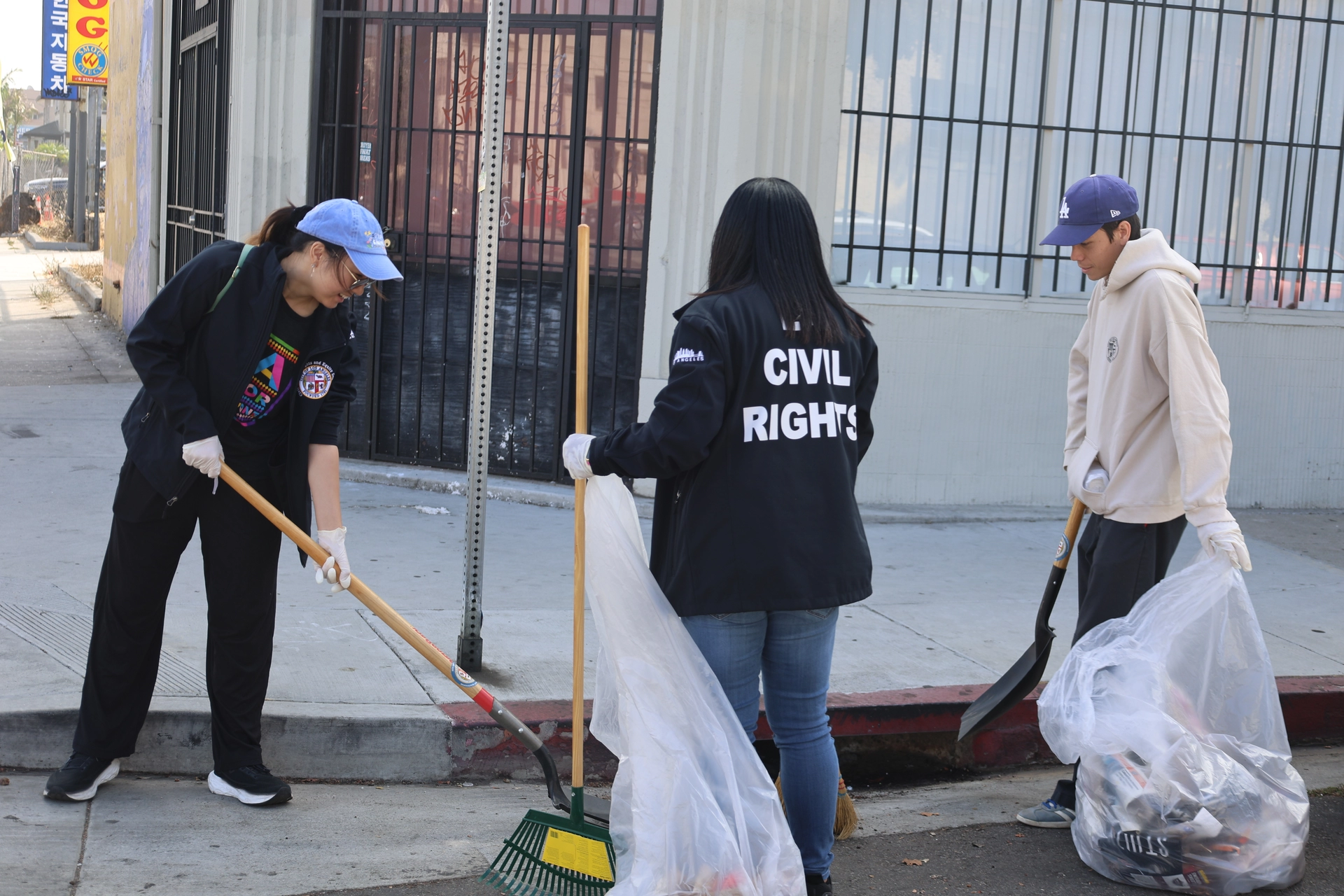 Cleaning up trash in the vicinity of Pico Blvd. for Tom LaBonge Day of Service