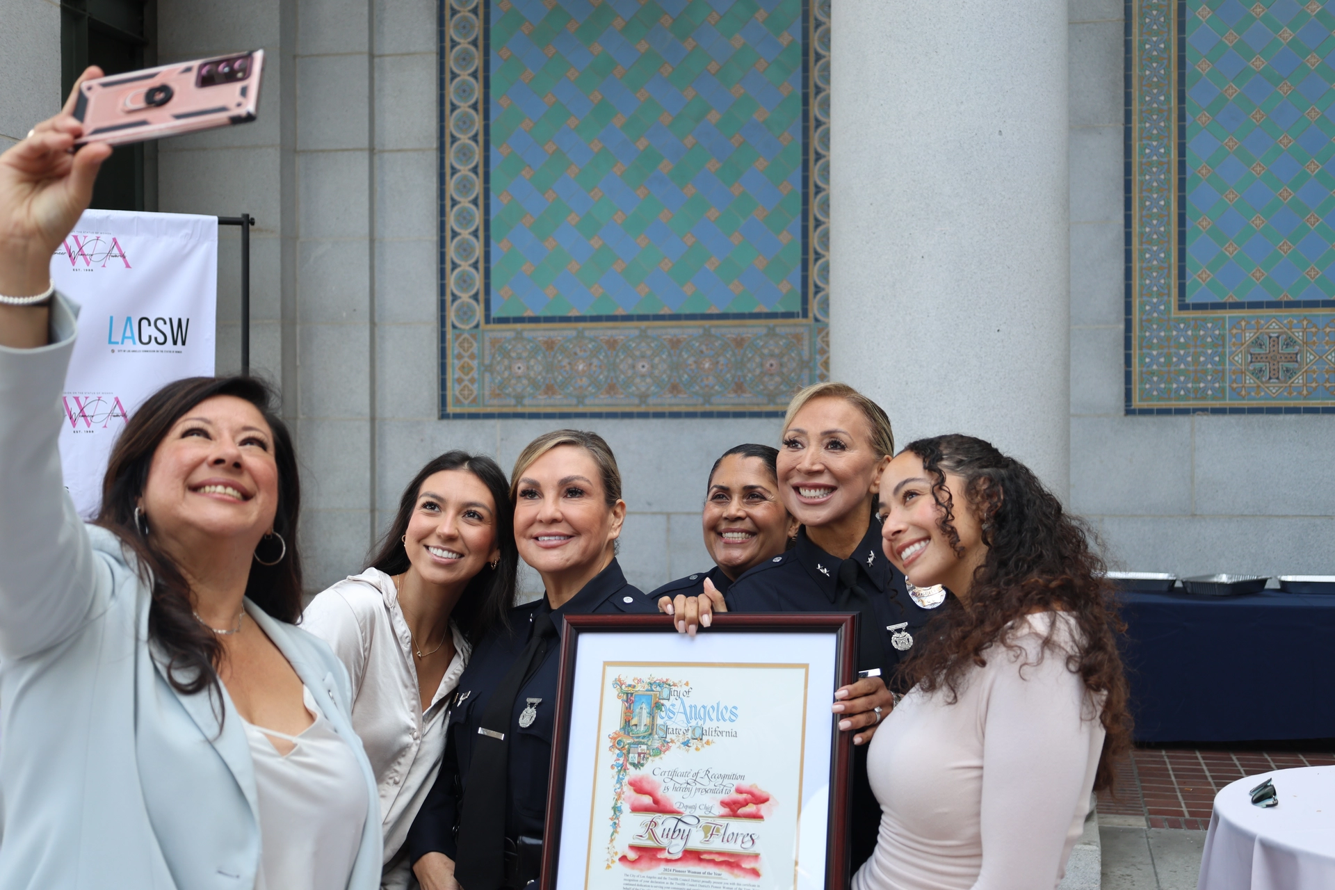 LAPD Deputy Chief Ruby Flores and family pose for selfie