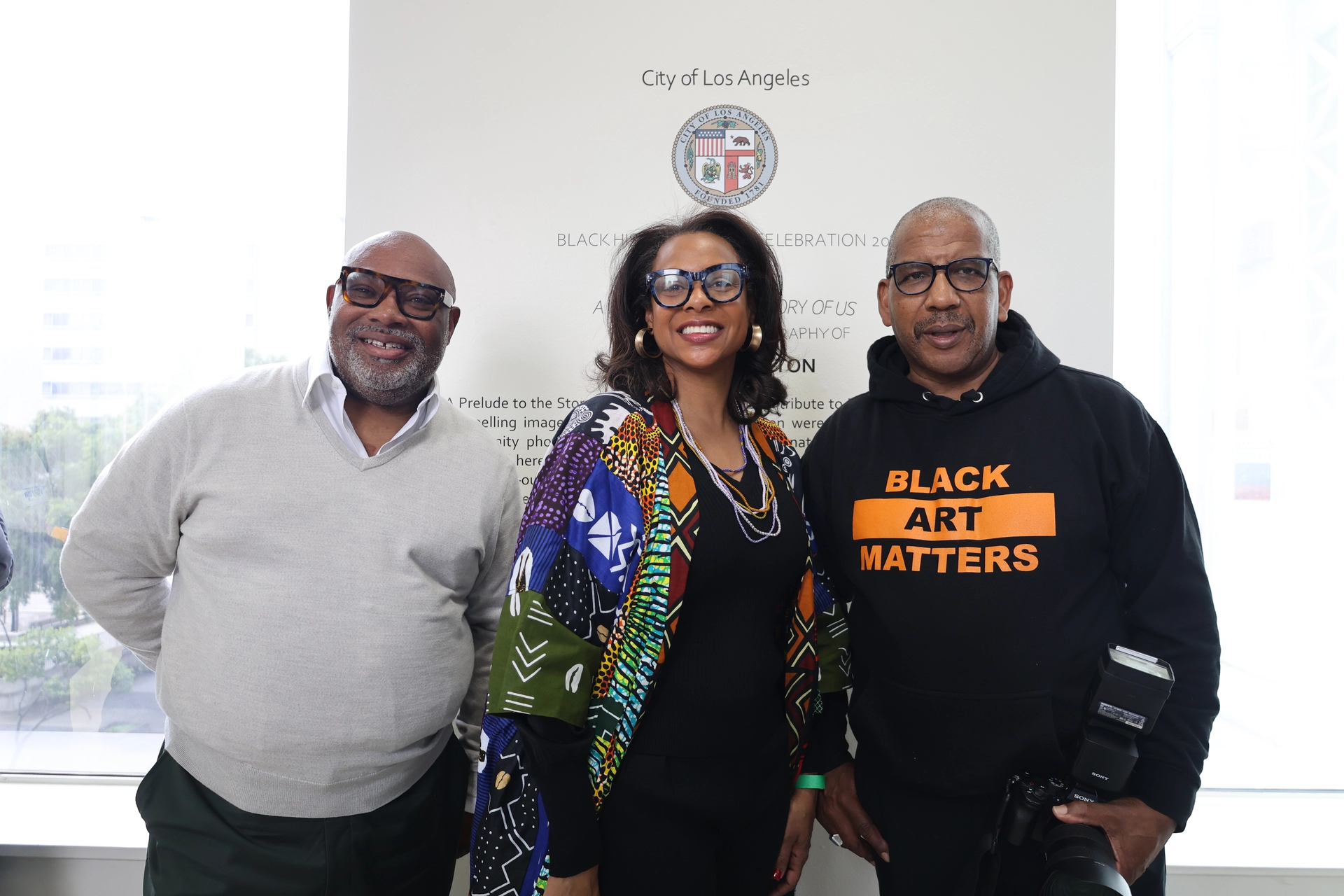 E.D. Capri Maddox posing with Leroy and another person at the Leroy Hamilton Ribbon Cutting Ceremony.