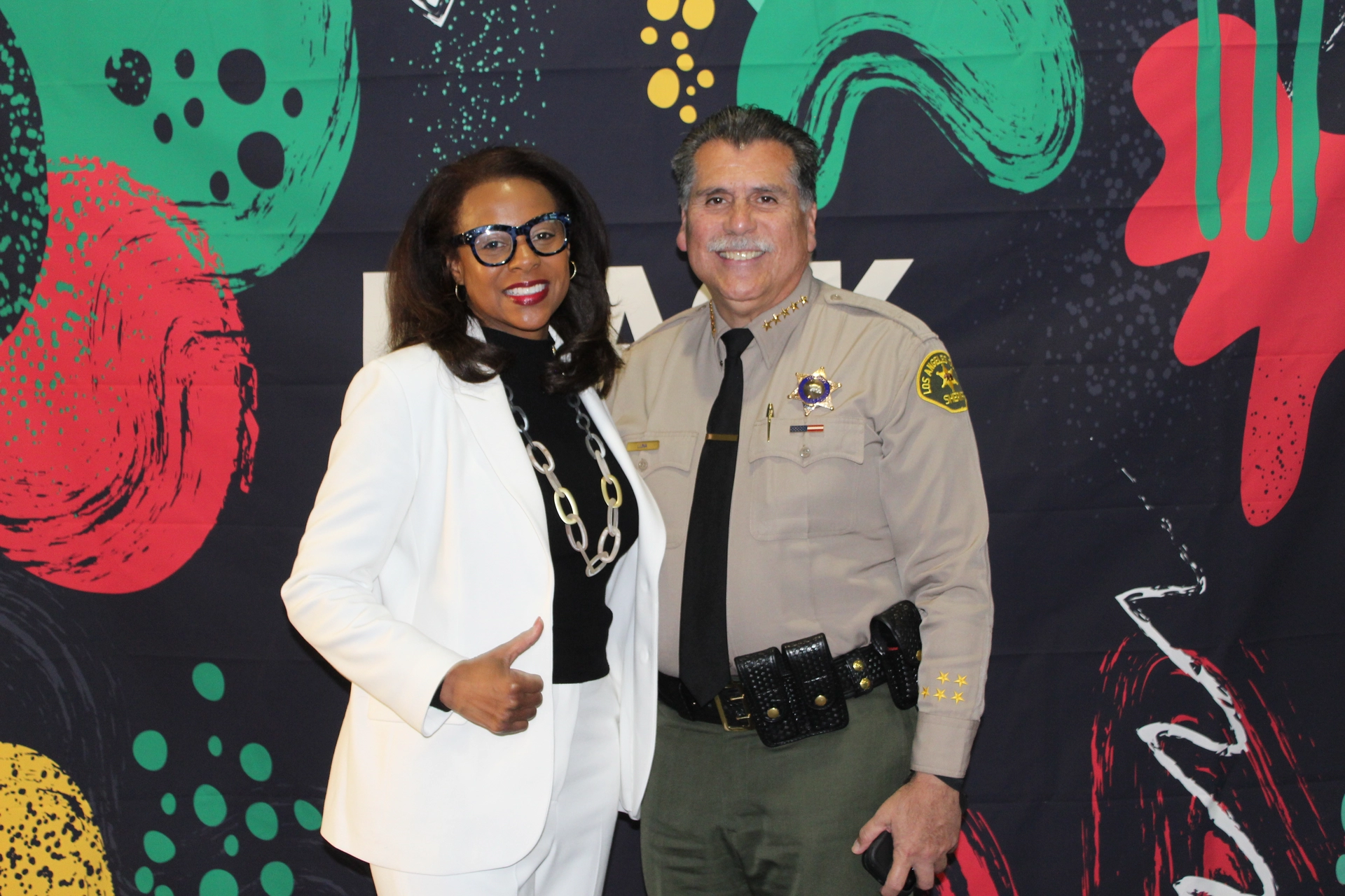 ED Capri Maddox and LA County Sheriff Robert G. Luna holding up a thumbs-up