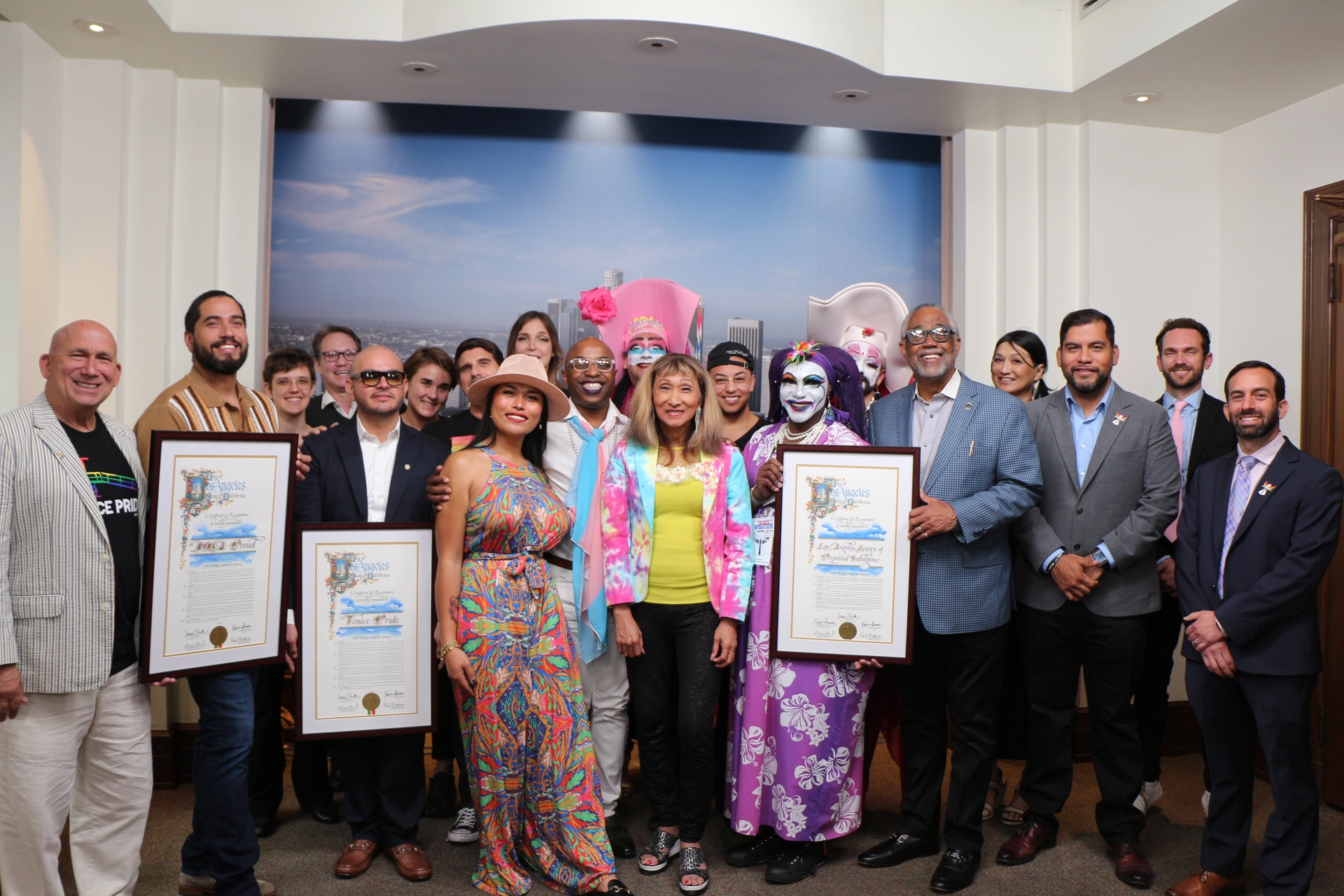 Group photo of members of TAC and Trans Chorus LA after receiving Pride Month certificates of recognition from City Council