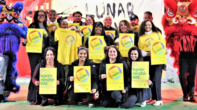 JSH Volunteers and Staff holding up the JSH Posters