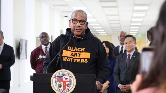 Leroy Hamilton speaks at the podium.