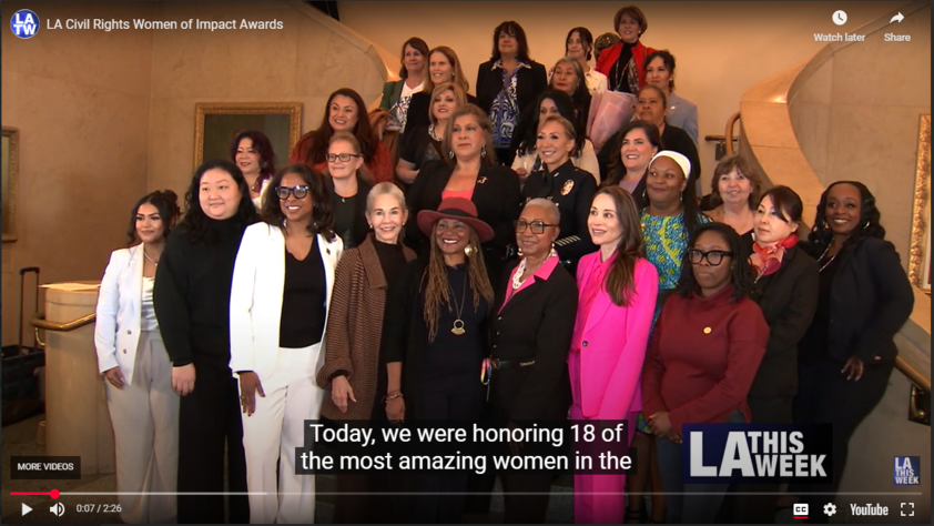 Still image of 30 women standing together with LA This Week and You Tube logos. Closed Caption reads Today we are honoring 18 of the most amazing women in the...