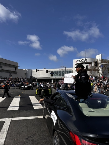 Capri Maddox sits atop a vehicle at the 38th Annual Kingdom Day Parade.