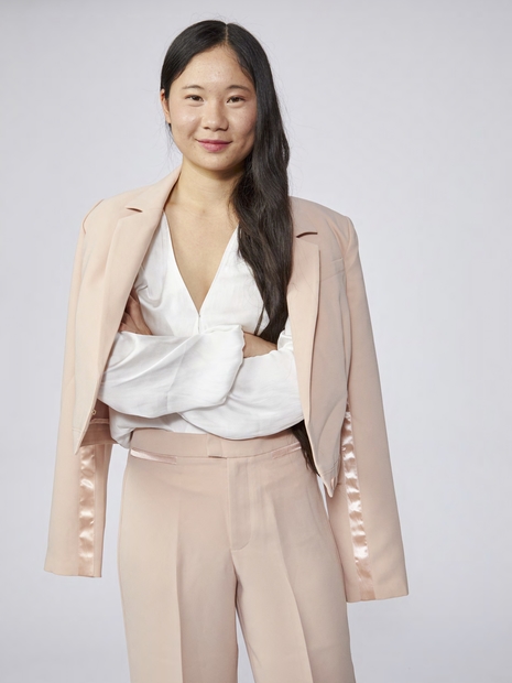 CCR Commissioner Lacy Lew Nguyen Wright headshot photo of her in a light pink pant suit