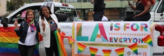LA Civil Rights Executive Director Capri Maddox parading with Councilwoman Traci Park at LA Pride
